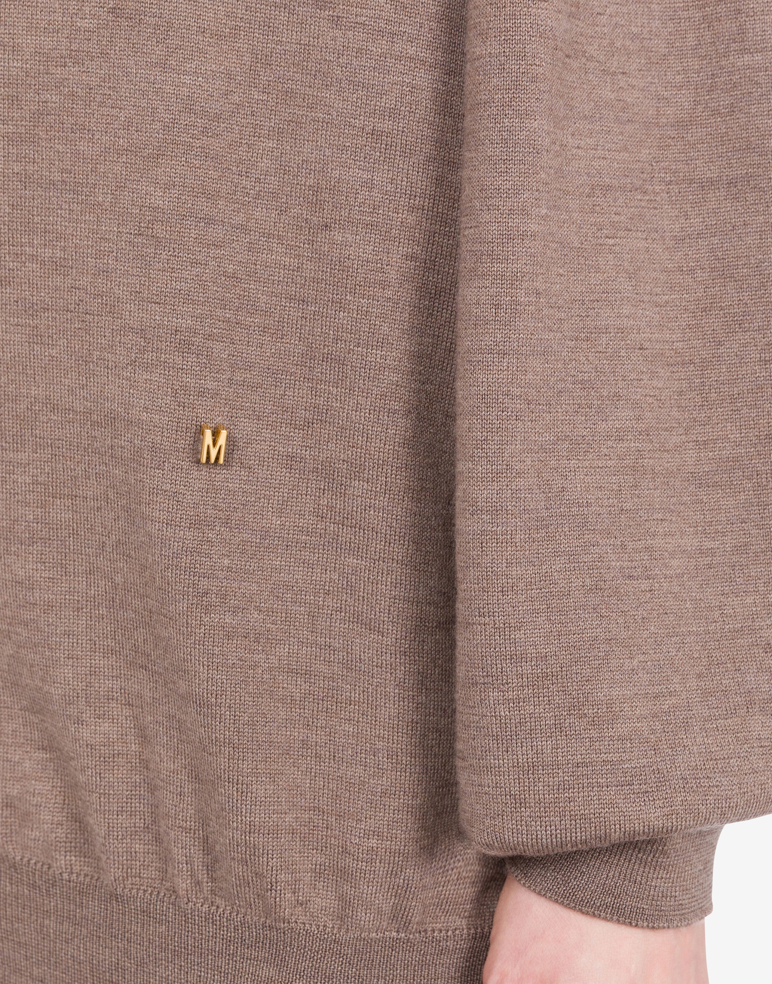 Turtleneck sweater in wool Golden M | Moschino