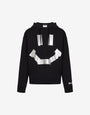Sudadera de algodón orgánico negra con estampado Smiley® en estilo «trompe-l'œil» con efecto de cinta adhesiva 