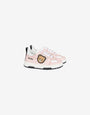 Sneakers in printed calfskin with a teddy bear patch