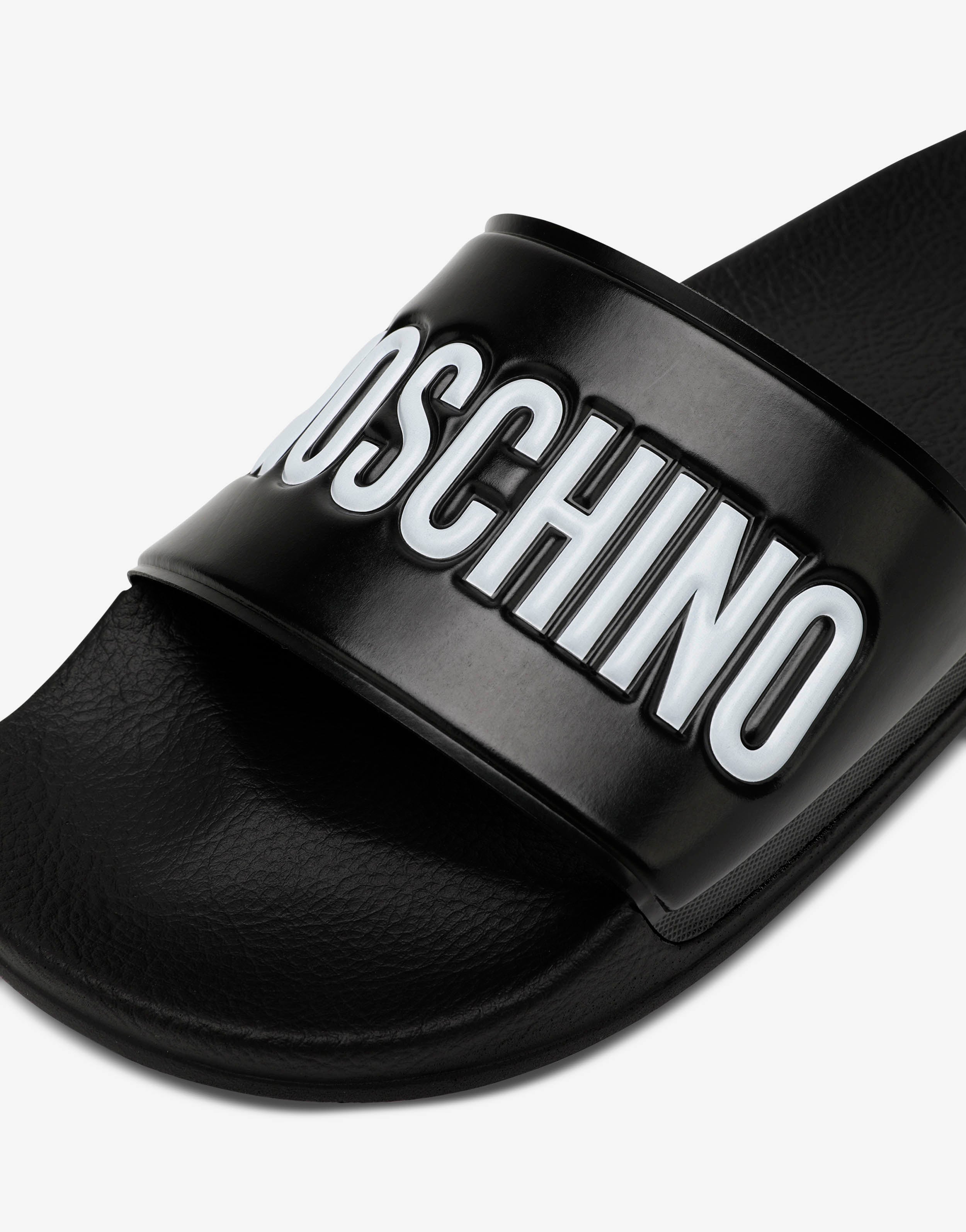 Pool slides in rubber with logo | Moschino